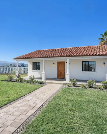 Modern backyard Accessory Dwelling Unit (ADU) under construction in Los Angeles, featuring wooden structural framing and professional site management by Best Construction LA.