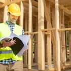 General contractor in Los Angeles supervising residential construction project on job site